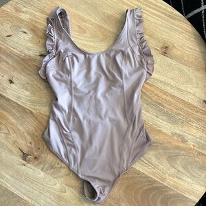 Never worn FP movement mauve ruffle bodysuit